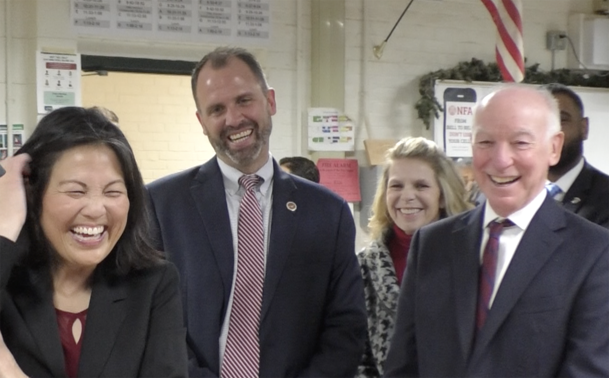 Acting U.S. Secretary of Labor Julie Su (left) shares a laugh with Congressman Joe Courtney (right), NFA Head of School Nathan Quesnel (second from left) and Linda Farinha (second from right), head of NFAs College and Career Center, as a student demonstrates the proper use of a manufacturing machine.